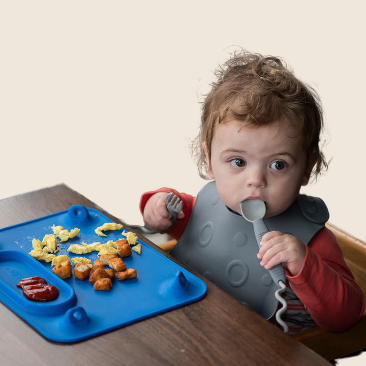 Utensilios de comer bebés ocupados