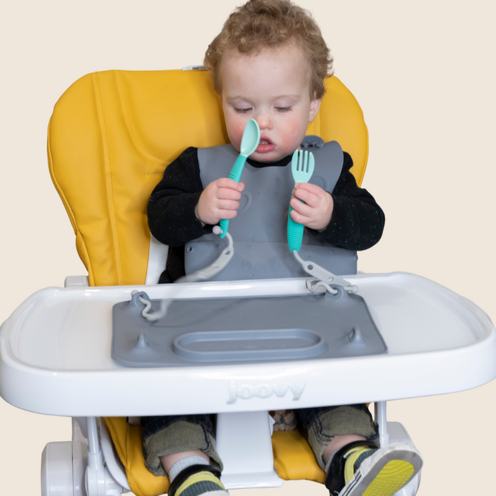 Utensilios de comer bebés ocupados