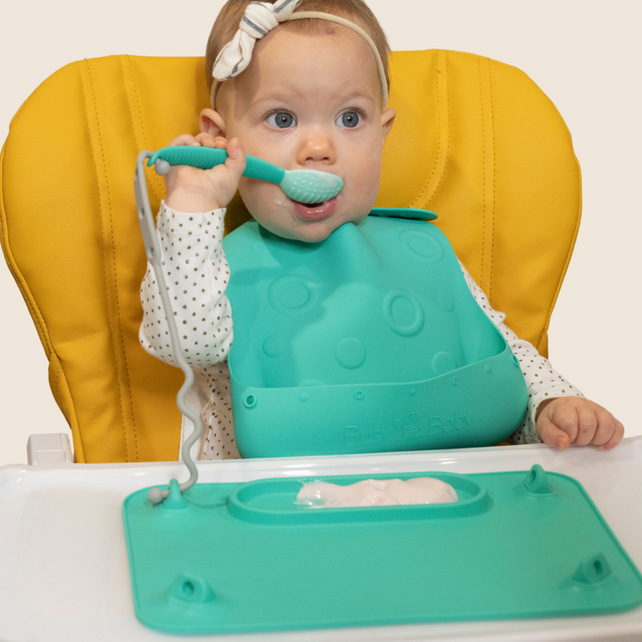 Utensilios de comer bebés ocupados