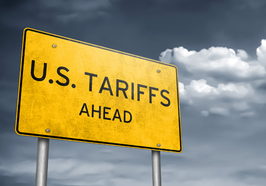 A yellow sign that says u.s. tariffs ahead